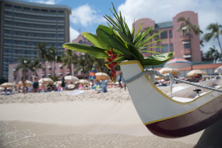 a boat sitting on top of a beach