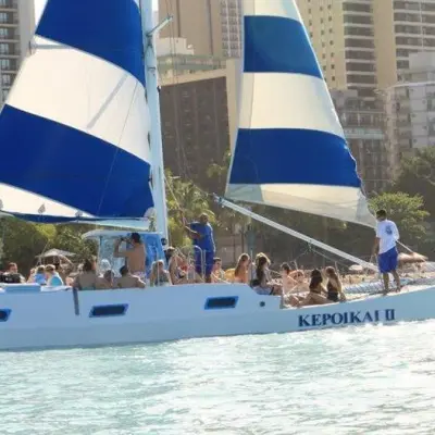 a group of people on a boat in the water