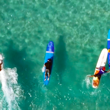 a group of people swimming in the water