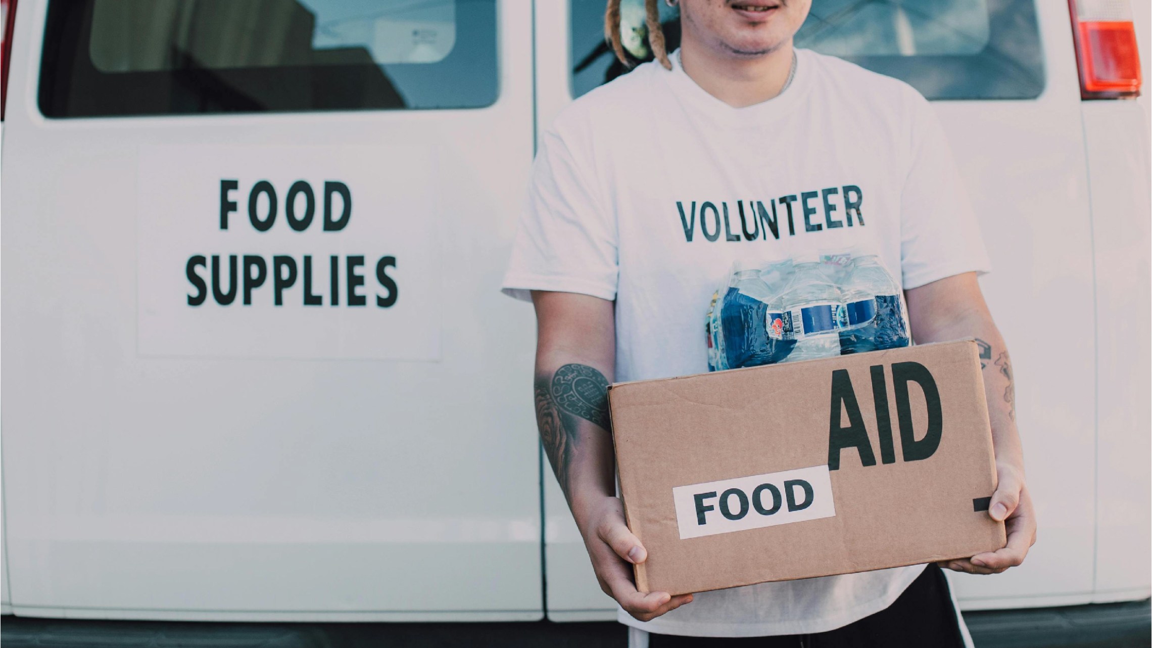 a man holding a sign